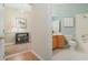 View of the entry hallway to a bathroom with a shower-tub combo at 325 Bellingrath Terrace, Deland, FL 32724