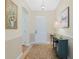 Welcoming entryway with decorative rug and stylish console table at 325 Bellingrath Terrace, Deland, FL 32724