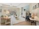 Cozy living room featuring plush seating and a serene view of the outdoors at 325 Bellingrath Terrace, Deland, FL 32724