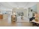 Bright and airy living room with large windows and comfortable seating arrangement at 325 Bellingrath Terrace, Deland, FL 32724