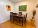 Dining area with hardwood floors, a dark wood dining table and chairs at 370 N Windmeadows St # 370, Altamonte Springs, FL 32701
