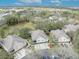 Beautiful aerial view of craftsman homes surrounded by mature trees and lush landscaping at 466 Ashley Brooke Ct # C, Apopka, FL 32712