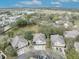Community aerial showcasing well-maintained homes surrounded by lush trees and green spaces at 466 Ashley Brooke Ct # C, Apopka, FL 32712