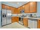 Bright kitchen with stainless steel appliances and lots of cabinet space at 466 Ashley Brooke Ct # C, Apopka, FL 32712