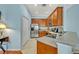 Bright kitchen featuring stainless steel appliances, and tile flooring at 466 Ashley Brooke Ct # C, Apopka, FL 32712