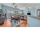 Cozy living room and dining area with ample natural light, creating a bright and airy space at 466 Ashley Brooke Ct # C, Apopka, FL 32712