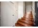 Inviting staircase with wood steps, leading to the upper level of the home at 466 Ashley Brooke Ct # C, Apopka, FL 32712