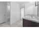Bright bathroom features double sinks, and access to the pool area at 4897 Gilded Jewel Dr, Mount Dora, FL 32757