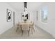 Bright dining room with contemporary decor and natural light at 4897 Gilded Jewel Dr, Mount Dora, FL 32757