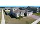 Well-maintained home featuring solar panels and a lush green lawn at 4897 Gilded Jewel Dr, Mount Dora, FL 32757
