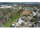 Aerial view of home and surroundings including nearby lake at 5136 Stratemeyer Dr, Orlando, FL 32839