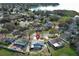 Aerial view of a home with a pool in a waterfront community at 5136 Stratemeyer Dr, Orlando, FL 32839