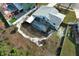 Bird's-eye view of a home with a screened pool and landscaped backyard at 5136 Stratemeyer Dr, Orlando, FL 32839