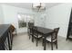 Elegant dining room with stylish furnishings, modern lighting, and plenty of space at 5136 Stratemeyer Dr, Orlando, FL 32839
