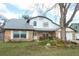 Charming two-story brick home with well-maintained landscaping and inviting curb appeal at 5136 Stratemeyer Dr, Orlando, FL 32839