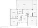 First floor plan featuring a primary bedroom, living room, dining room, kitchen, and garage at 5136 Stratemeyer Dr, Orlando, FL 32839