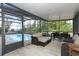 Outdoor patio with screen and furniture plus views to pool at 5136 Stratemeyer Dr, Orlando, FL 32839