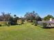 Aerial view of a lush backyard and screened lanai, showcasing the home's private setting at 777 Crepe Myrtle Cir, Apopka, FL 32712