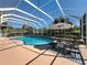 Beautiful pool area with lounge chairs, privacy landscaping and screened enclosure at 777 Crepe Myrtle Cir, Apopka, FL 32712