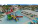 Aerial view of community pool, playground, and clubhouse amenities at 9026 Rhodes St, Kissimmee, FL 34747