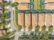 Aerial view of a residential area, highlighting the property's layout with its private screened in pool and spa at 9026 Rhodes St, Kissimmee, FL 34747