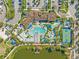Aerial view of community amenities including a pool, lazy river, water park and basketball court at 9026 Rhodes St, Kissimmee, FL 34747