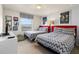 Bedroom with twin beds, black and white zigzag bedding, and Mickey Mouse themed wall art at 9026 Rhodes St, Kissimmee, FL 34747