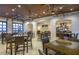 Spacious clubhouse with tables, chairs, and televisions for resident enjoyment at 9026 Rhodes St, Kissimmee, FL 34747