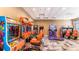 Amusement awaits in this community game room, featuring an array of classic arcade and driving games for endless fun at 9026 Rhodes St, Kissimmee, FL 34747