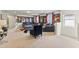 Bright living room features a comfortable sectional sofa and a stylish black armchair at 9026 Rhodes St, Kissimmee, FL 34747