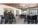 Spacious lounge area featuring modern decor, comfortable seating, and direct access to a relaxing outdoor pool at 9026 Rhodes St, Kissimmee, FL 34747