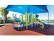 Enjoy outdoor play at the community playground, complete with slides and a covered play structure for sunny days at 9026 Rhodes St, Kissimmee, FL 34747