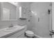 Modern bathroom features a glass-enclosed shower, vanity with sink, and updated fixtures at 114 Tuscany Villas Dr, Edgewater, FL 32141