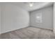 Comfortable bedroom with neutral carpet and window allowing natural light at 114 Tuscany Villas Dr, Edgewater, FL 32141