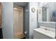 Modest bathroom with single sink vanity and step-in shower with curtain at 1170 Calle Del Rey # D, Casselberry, FL 32707