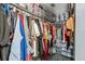 Walk-in closet with ample storage racks and shelves for organizing clothes and personal items at 1170 Calle Del Rey # D, Casselberry, FL 32707