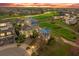 Beautiful community with golf course views, lush landscaping, and elegant homes with well-manicured lawns at 1432 Titian Ct, Reunion, FL 34747