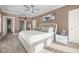Primary bedroom with a walk-in closet and en suite bath at 1432 Titian Ct, Reunion, FL 34747