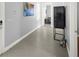 Elegant entryway with tiled floors, neutral walls, and modern decor for a sophisticated welcome at 1432 Titian Ct, Reunion, FL 34747