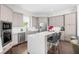 Sleek kitchen featuring white countertops, modern appliances, and ample cabinet space, perfect for cooking at 1432 Titian Ct, Reunion, FL 34747