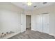 Inviting bedroom with ceiling fan, neutral walls, plush carpeting, and closet at 15489 Honeybell Dr, Winter Garden, FL 34787