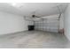 Spacious two-car garage with automatic door and ample storage space at 15489 Honeybell Dr, Winter Garden, FL 34787