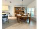 Dining room featuring a table with seating for six and bright lighting at 1733 Weeping Elm Cir, Port Orange, FL 32128