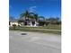 Charming single story home with mature landscaping and a well-manicured lawn at 1733 Weeping Elm Cir, Port Orange, FL 32128