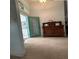 Foyer with tile flooring, stained glass, and decorative cabinet at 1733 Weeping Elm Cir, Port Orange, FL 32128