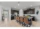 Spacious kitchen with a large center island and bar stool seating at 1841 Sawyer Palm Pl, Kissimmee, FL 34747