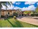 Charming, well-maintained home boasts lush landscaping, a circular driveway, and a welcoming two-car garage at 2313 Roat Dr, Orlando, FL 32835