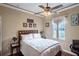 Cozy bedroom with natural light and simple furnishings for a peaceful atmosphere at 290 Thomas Dr, Casselberry, FL 32707
