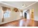 Spacious bedroom with vaulted ceilings, ceiling fan, and ensuite bath and walk-in closet at 290 Thomas Dr, Casselberry, FL 32707