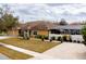 Charming home featuring a well-maintained lawn and inviting curb appeal at 290 Thomas Dr, Casselberry, FL 32707